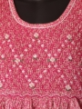 Robe smocks manches longues en tissu finette imprimé petites fleurs roses