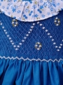 Robe smocks sans manches en coton bleu bordure fleurie