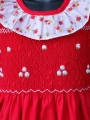 Robe smocks sans manches en coton rouge bordure fleurie