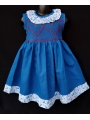 Robe smocks sans manches en coton bleu bordure fleurie