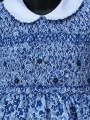 Robe smocks manches ballons  en coton fleurs bleues