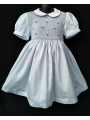 Robe smocks manches ballons col blanc en coton piqué bleu ciel